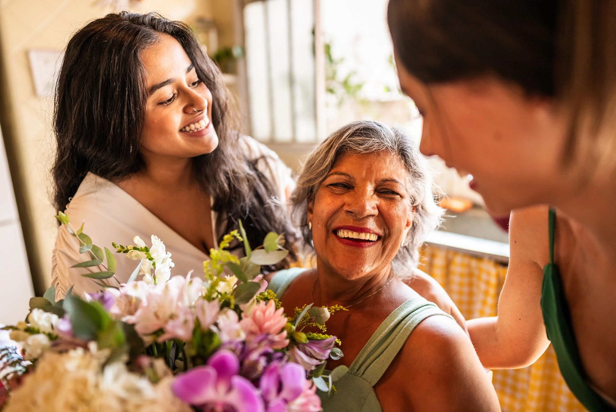 Family sharing a caring moment at home